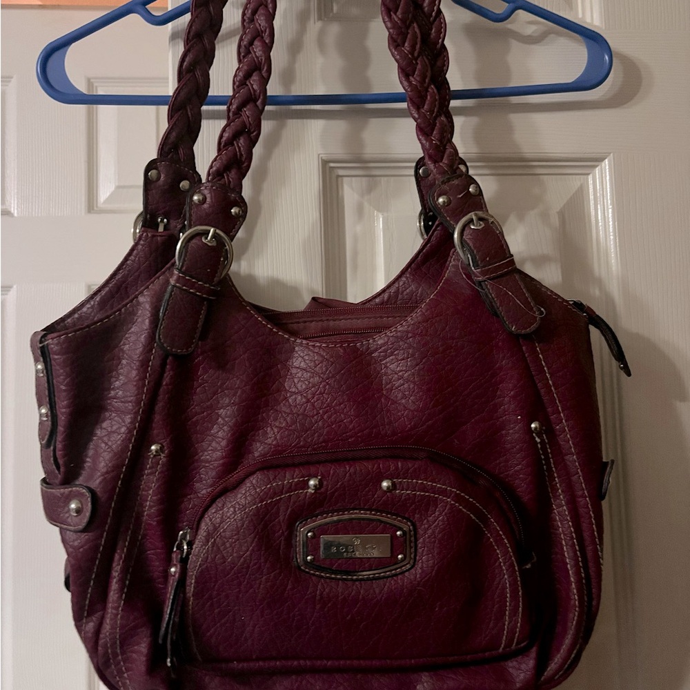 Rossetti dark purple pink purse with braided handles.